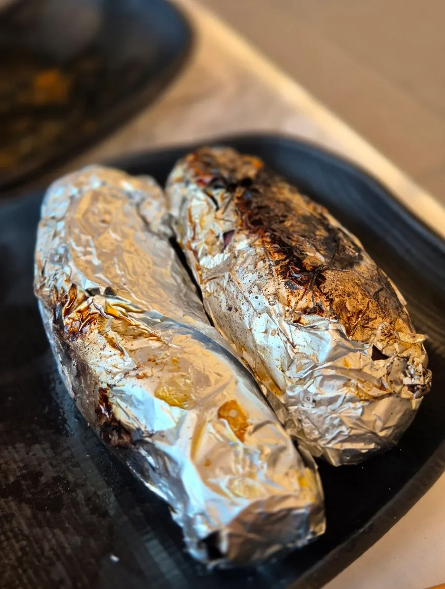 A piece of spicy stir-grilled duck coated in seasoning