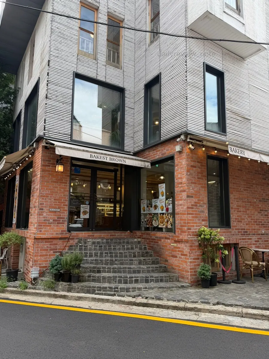 Exterior of Bakerist Brown, a standalone red brick building