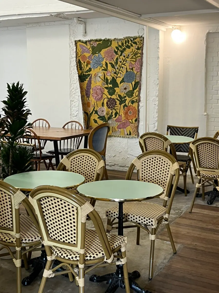 Café seating full of customers even on a weekday morning