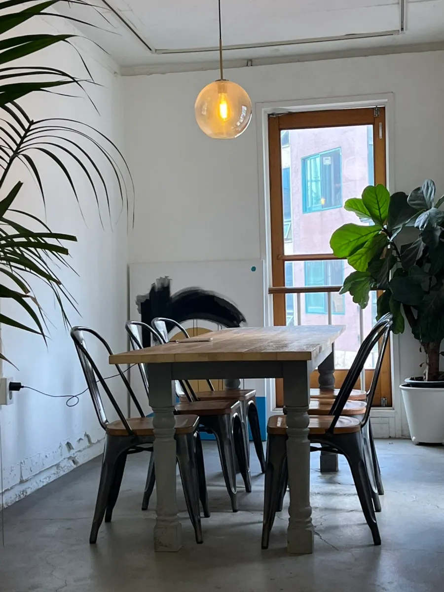 A café floor with people meeting and gathering