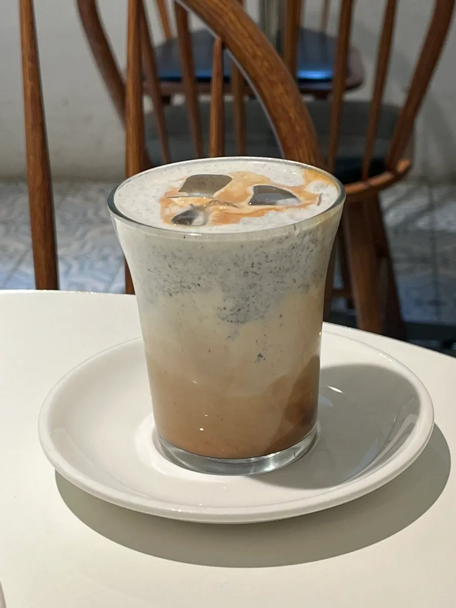 A cup of Bakerist Brown's black sesame latte