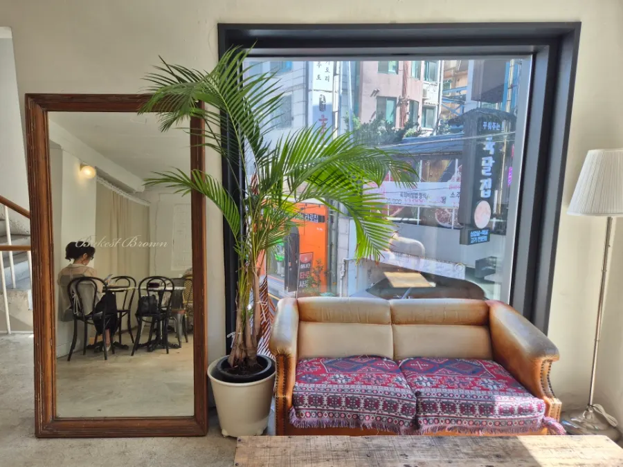 Sunlit window seat photo spot