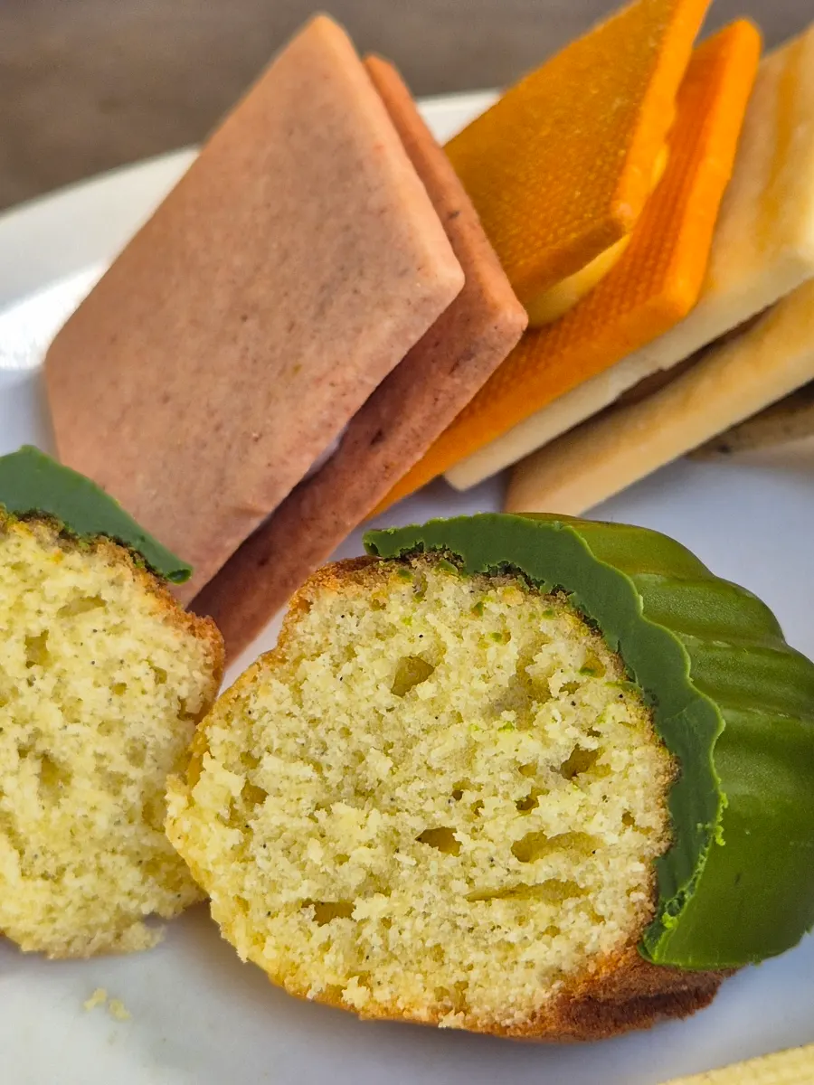 Matcha madeleine topped with matcha chocolate