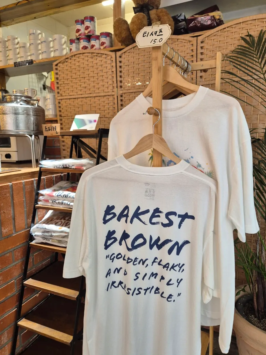 T-shirts, mugs, and other bakery café goods
