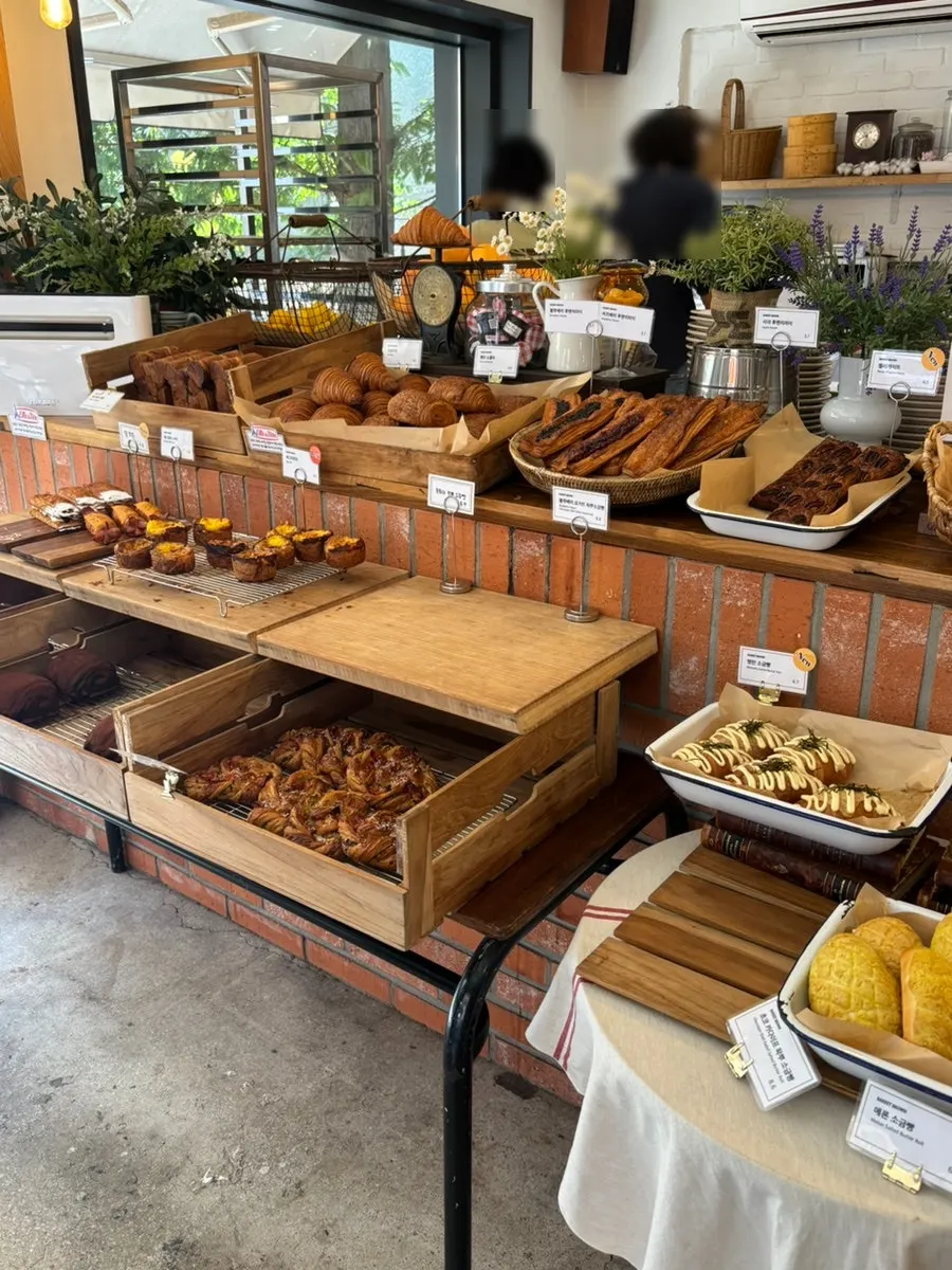 Display case with salt bread and pastries