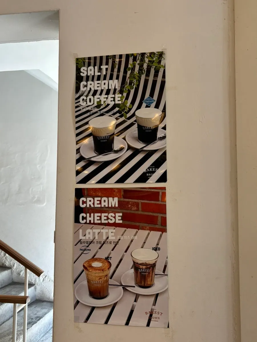 Drink menu sign listing the cream latte series