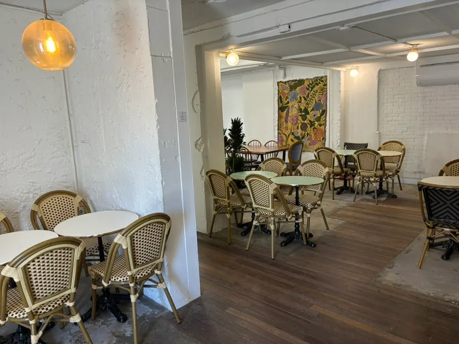 Lighting and seating inside Bakerist Brown