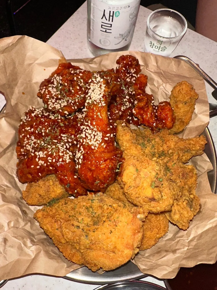 Complimentary popcorn and chicken with soju