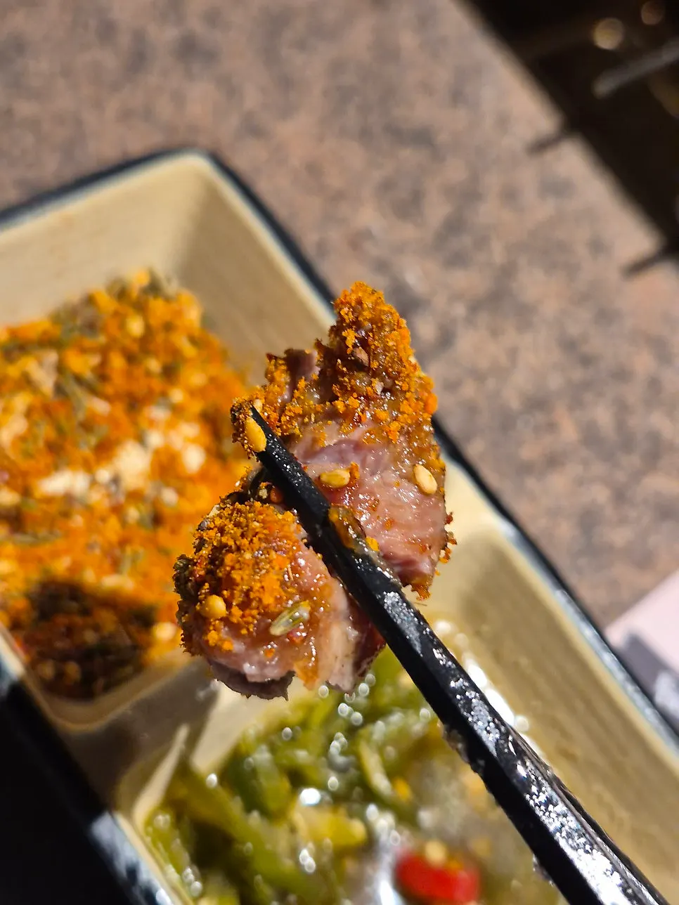 Lamb skewers with charcoal aroma