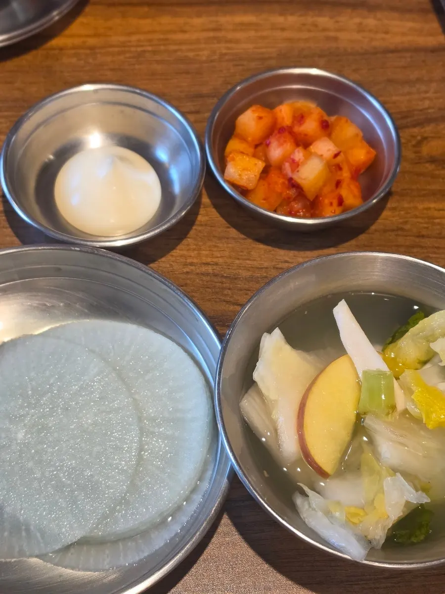 Nakgopsae and the basic side dishes