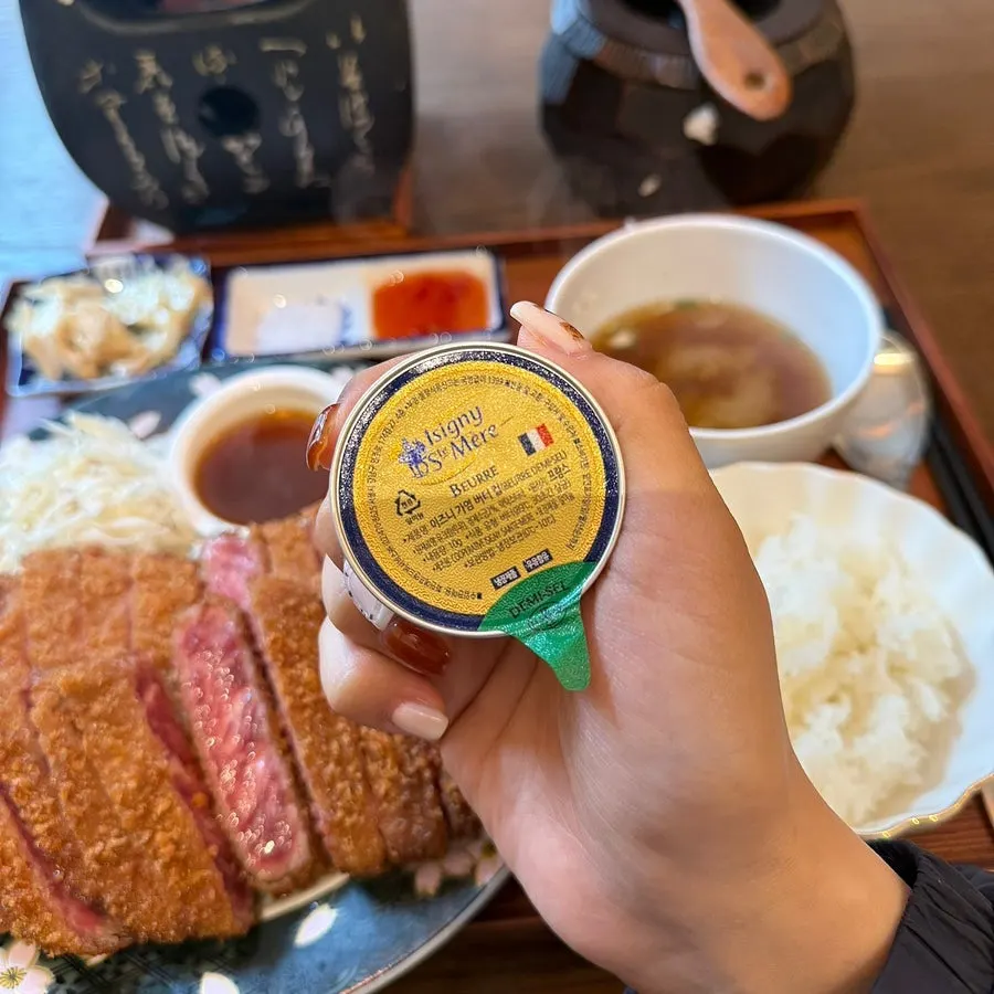 Isigny butter melting on the personal tabletop grill