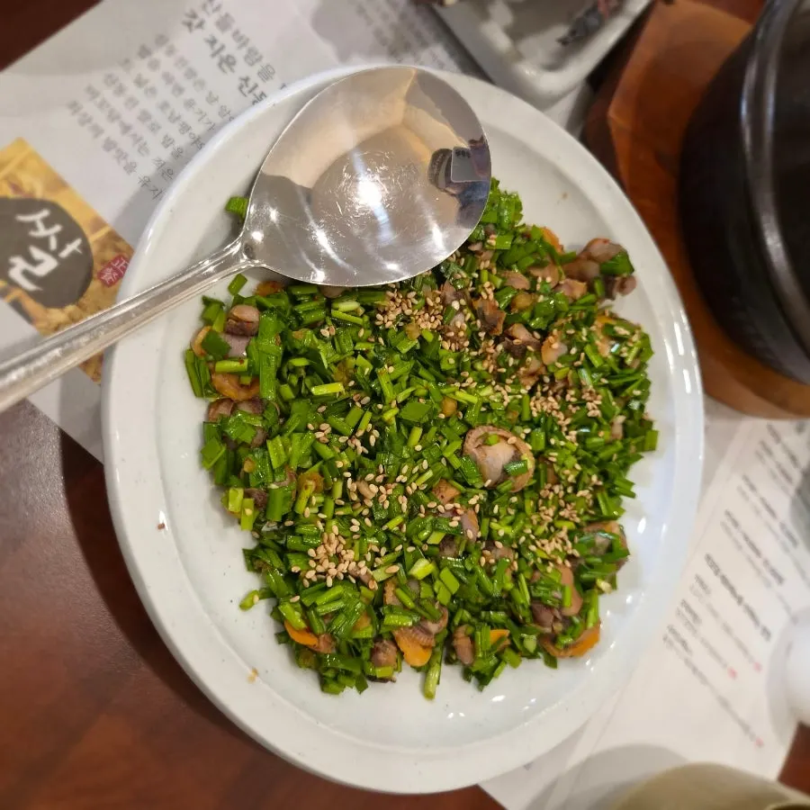 Cockle bibim with soy dressing, loaded with chives and cockles