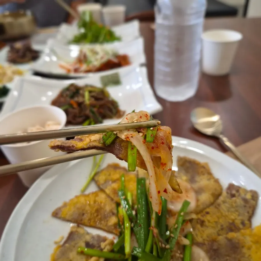Medium-size beef jeon topped with chives and onions