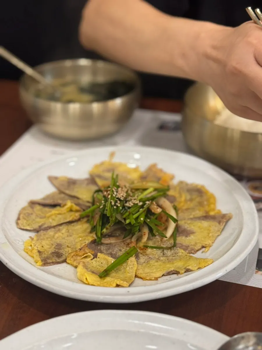 Warm yukjeon with seasoned chives