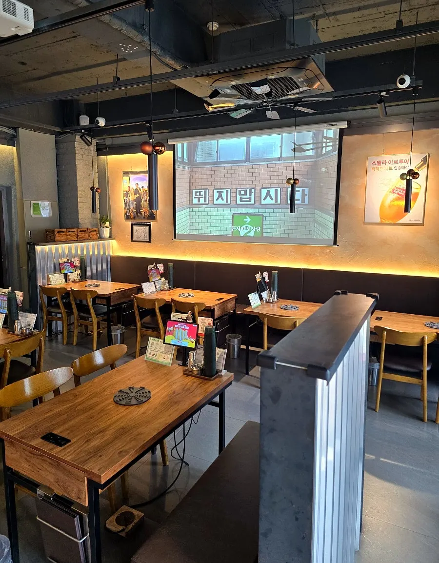Wood-toned interior of Gungmin Nakgopsae Gangseo Branch