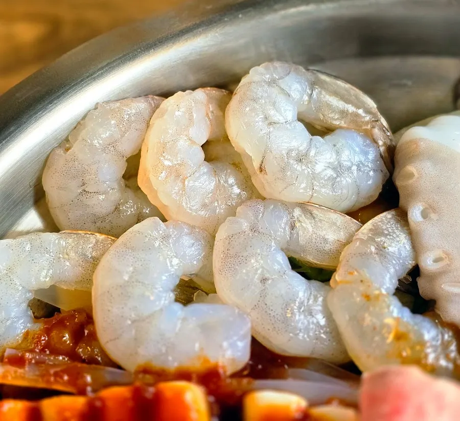Pot of beef intestine nakgopsae with added pork belly