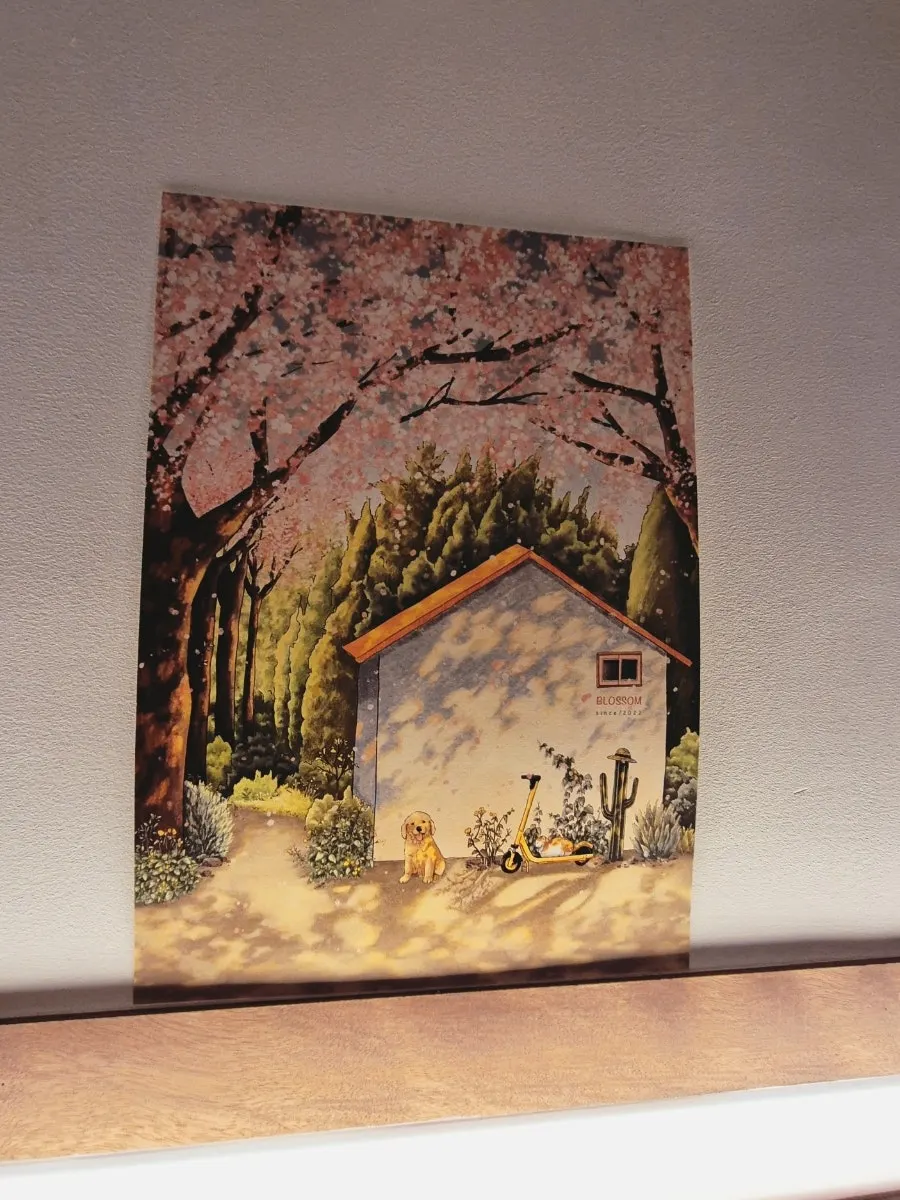 Interior decor with illustration frames and cherry blossom accents