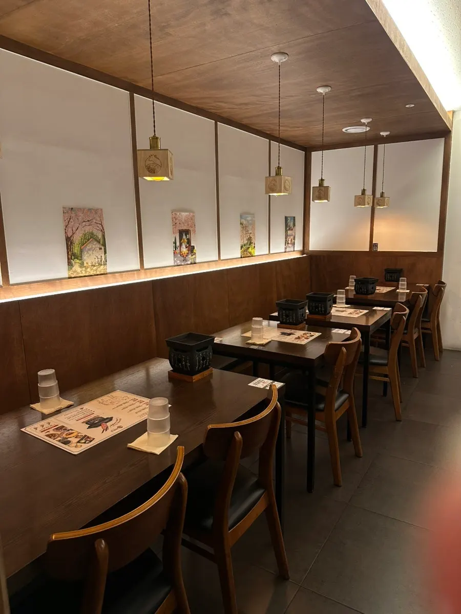 Interior with tables for two and group seating