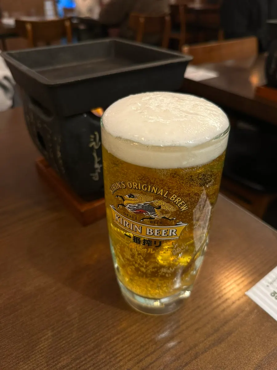 A glass of Kirin draft beer, 420ml