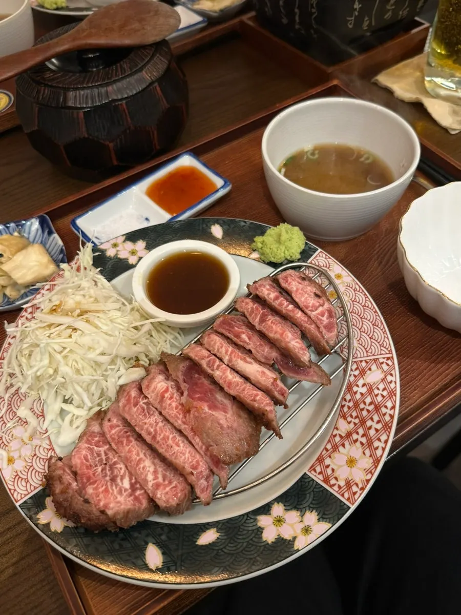 Full table spread of gyukatsu and sirloin steki set