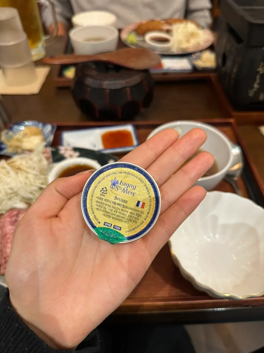 A pat of butter served with each dish