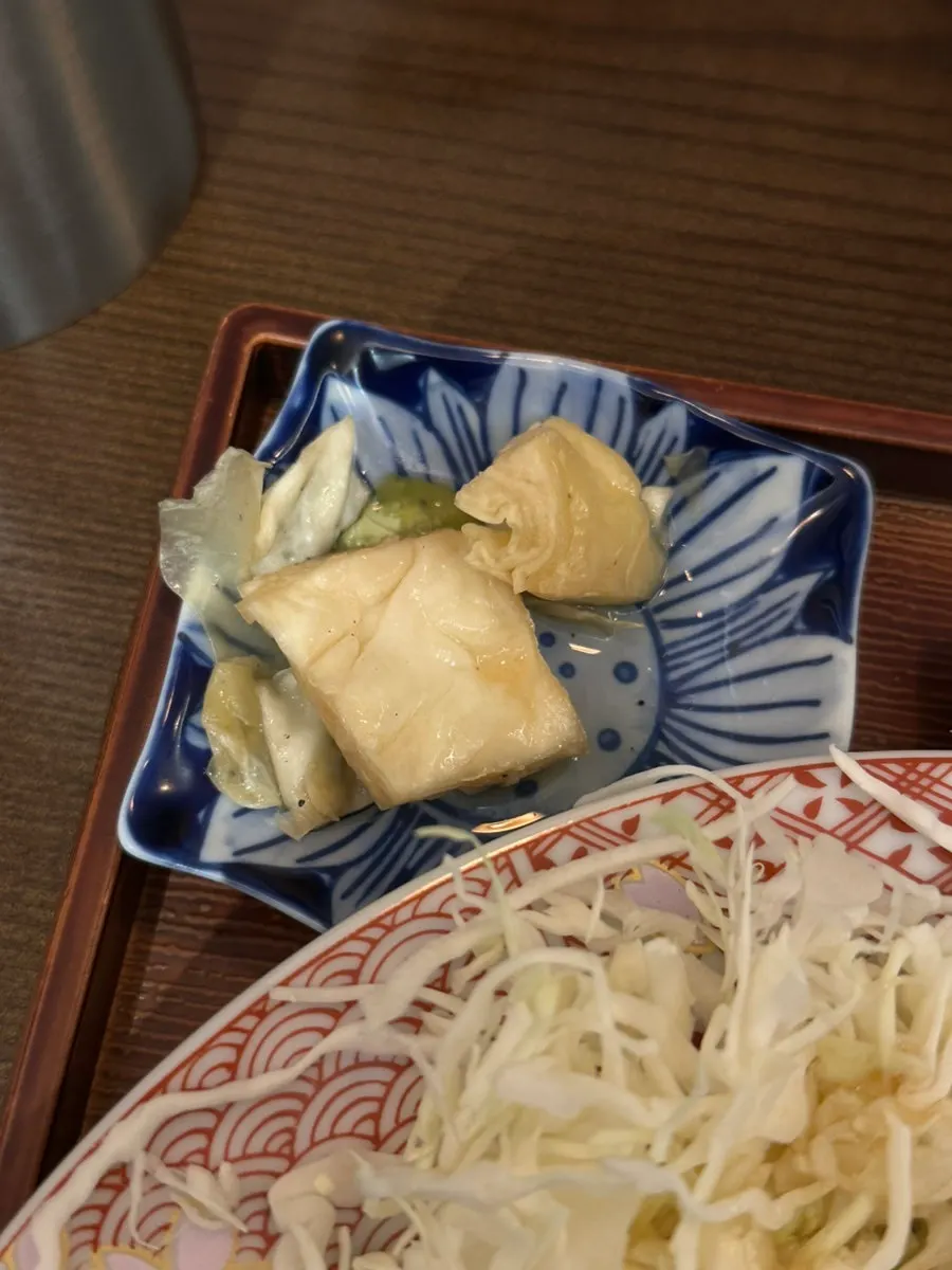 Cabbage side dish served with the gyukatsu