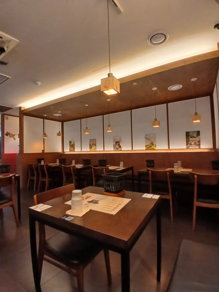 Interior with wood-toned decor and warm lighting