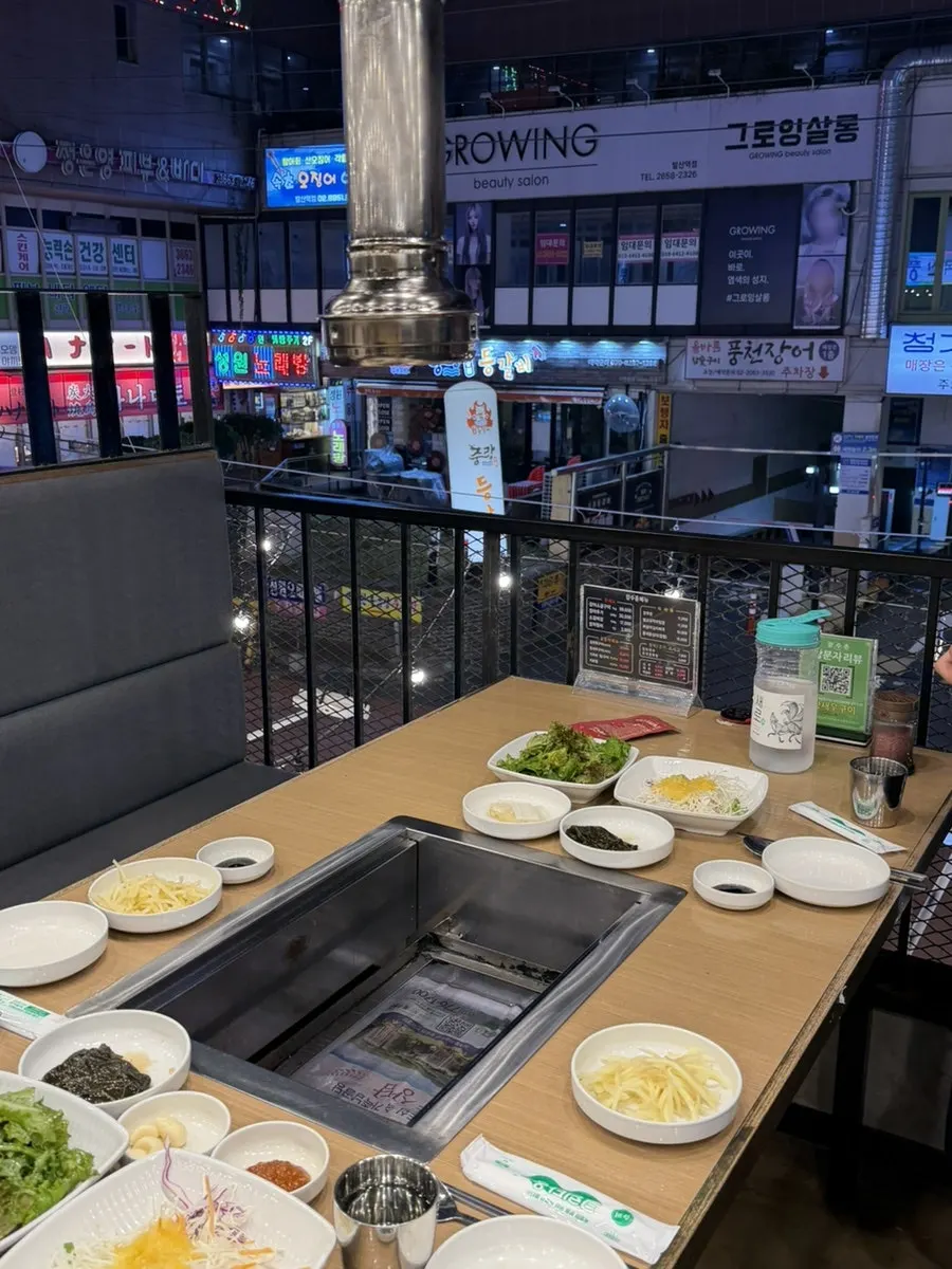 View of the 2nd-floor seating area with the windows open