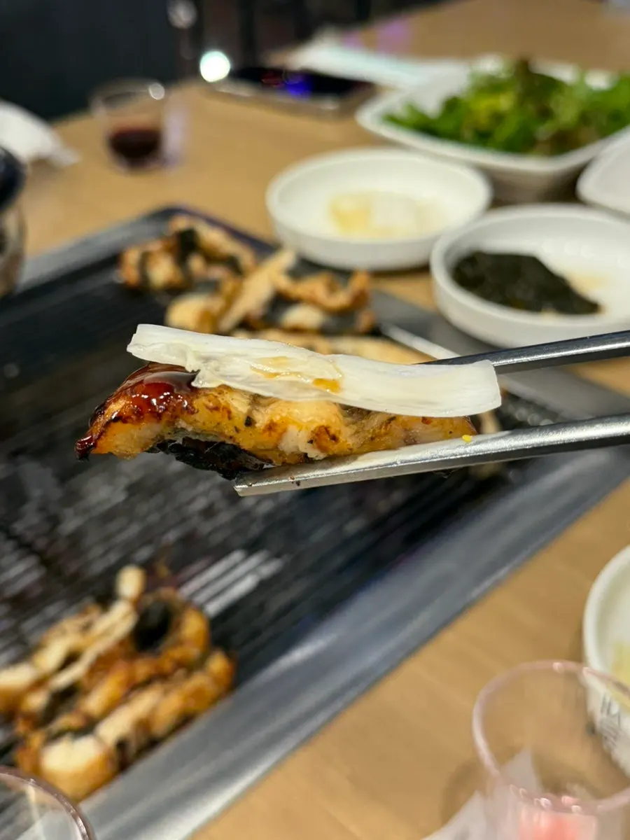 A plump, fatty piece of grilled eel
