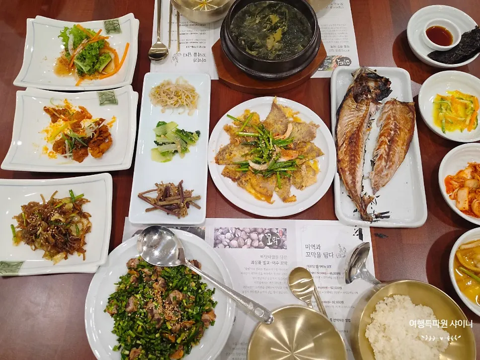 Table filled with side dishes for the set for two