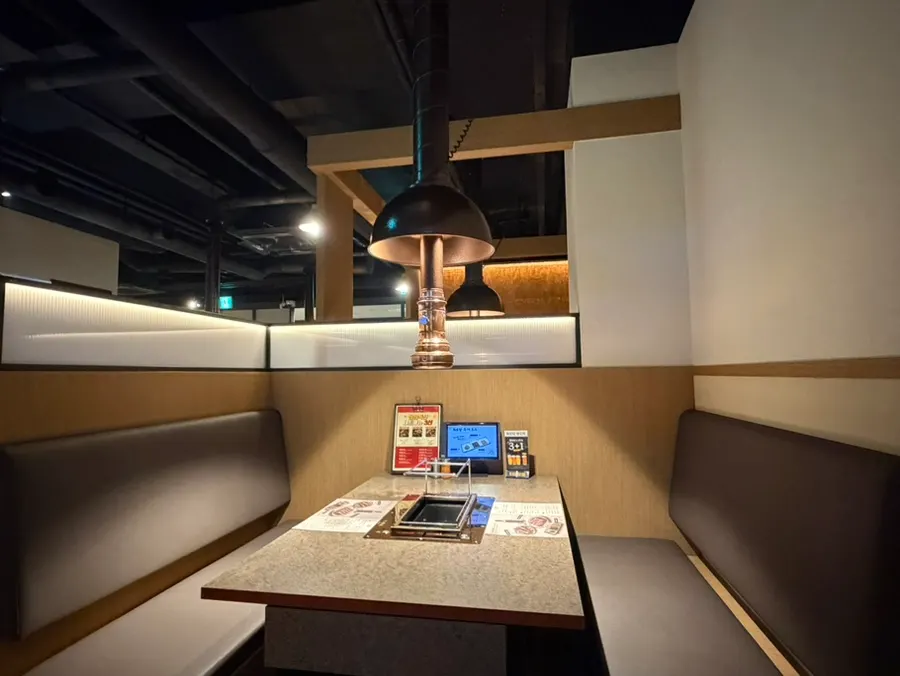 Interior of the restaurant with spacious tables and a private room