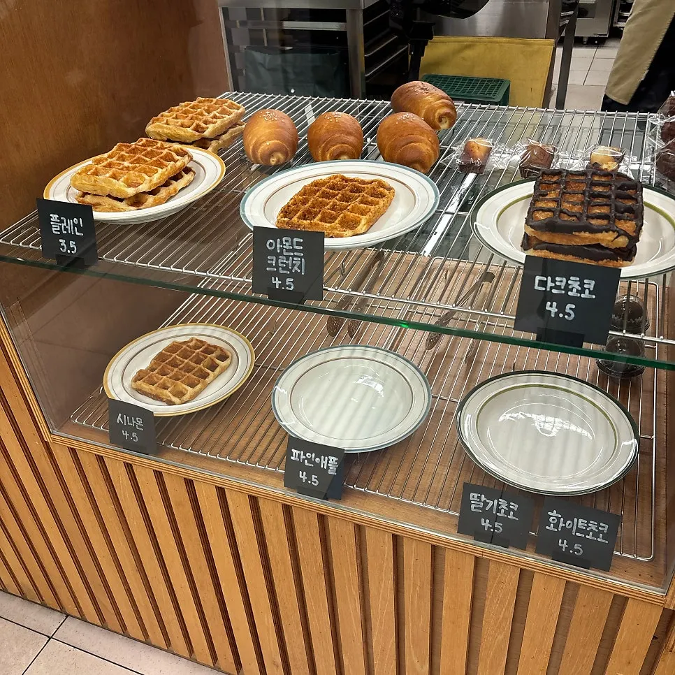 A display case with a variety of waffles