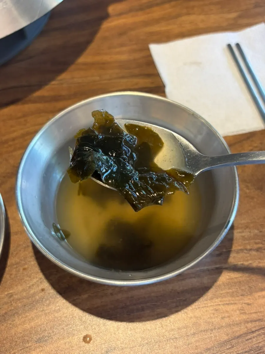 Nakgopsae wrap made with perilla leaf and radish wrap
