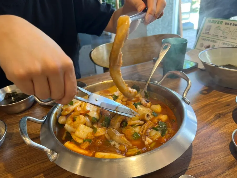 Nakgopsae with rice cakes and glass noodles