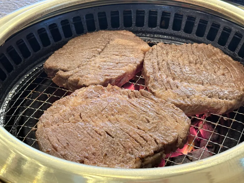 Close-up of marinated pork ribs cooking