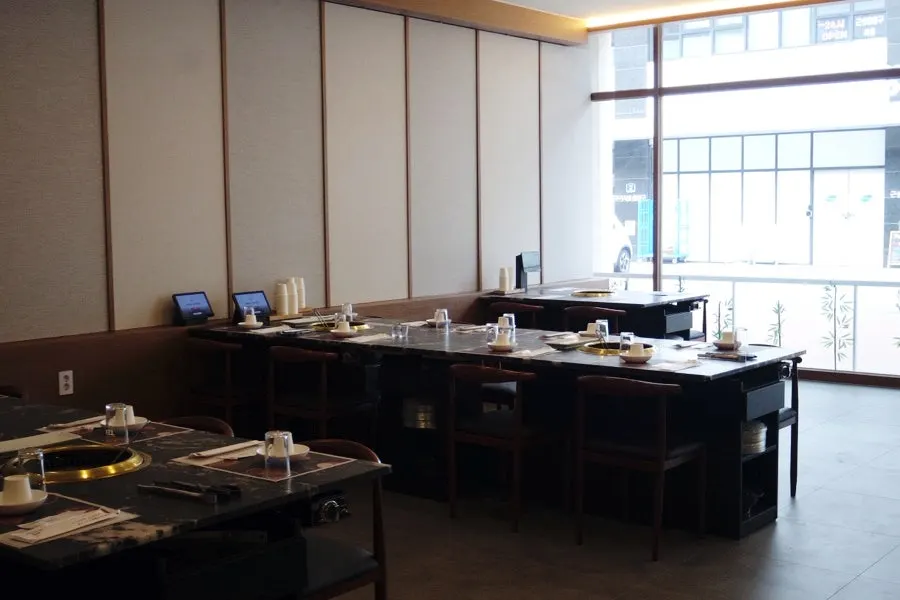 Tables in the spacious restaurant interior