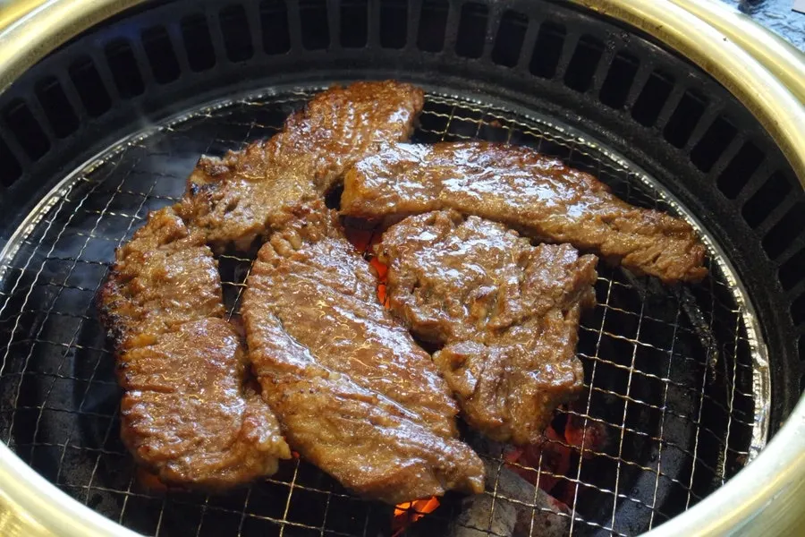 Staff grilling galbi