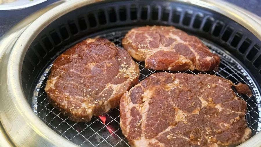 A generous plate of three servings of pork galbi