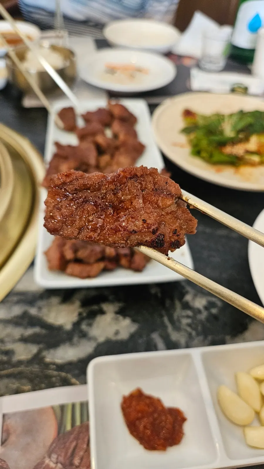 Marinated pork galbi grilling on the plate