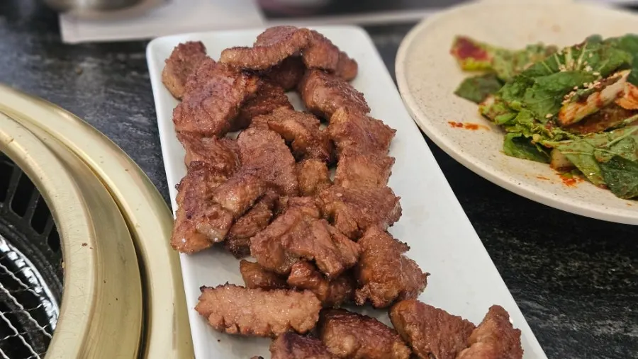 Golden-grilled pork galbi plated and ready to eat