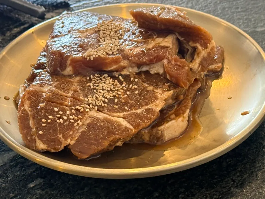 Browned, well-cooked pork ribs cut into pieces