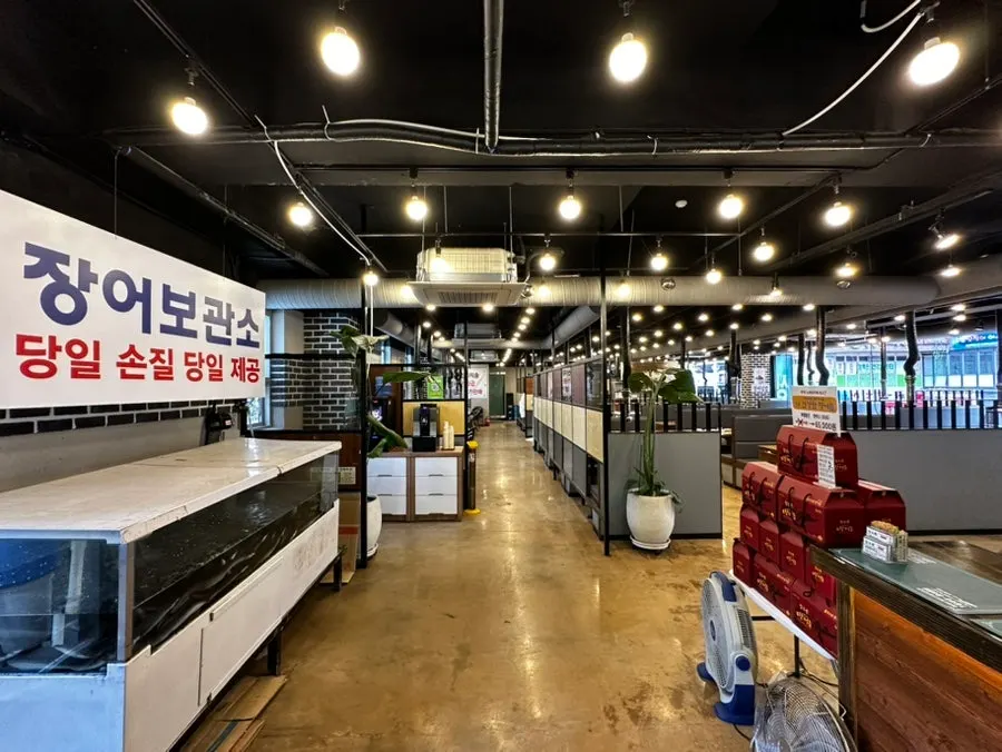 Spacious 2nd floor interior with wide tables at Jangsuchon Pungcheon Eel