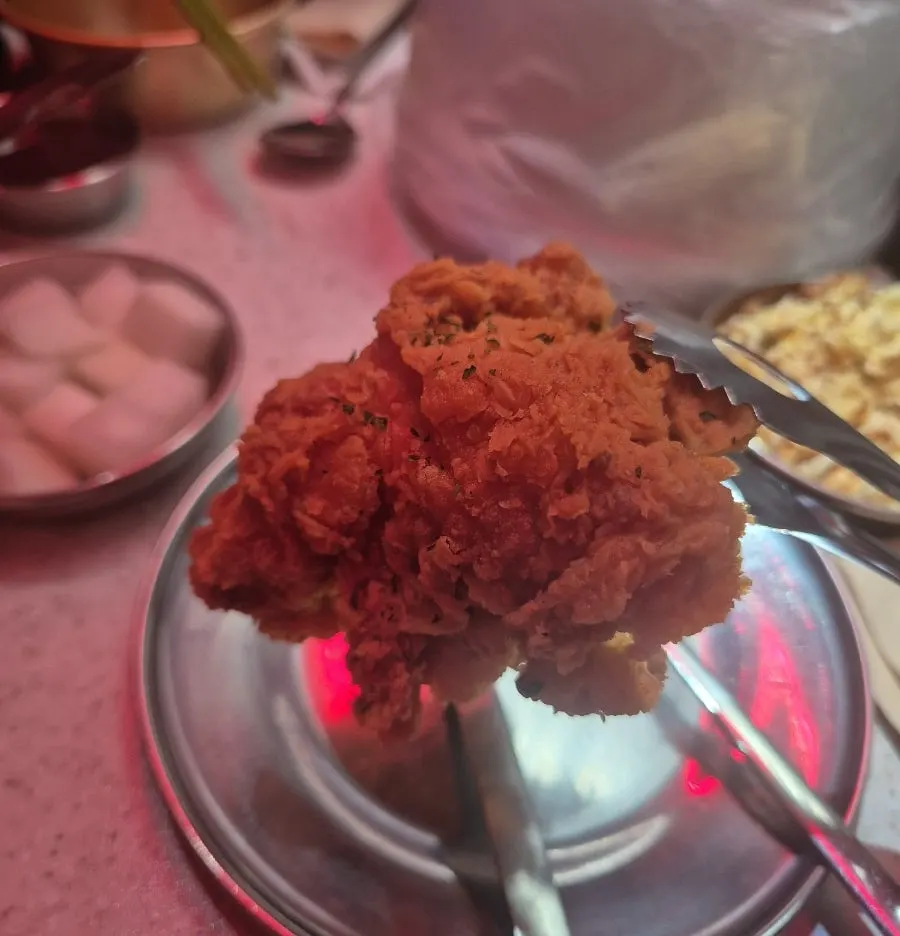 Piece of fried chicken with crispy batter