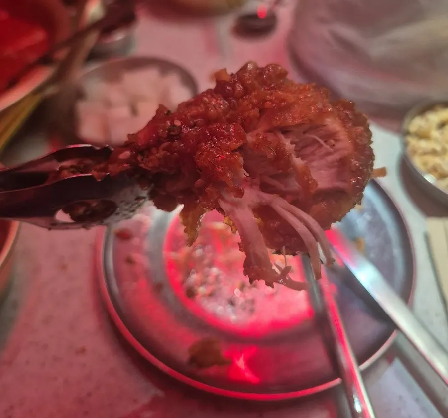 Comparing the fried and soy sauce chicken halves
