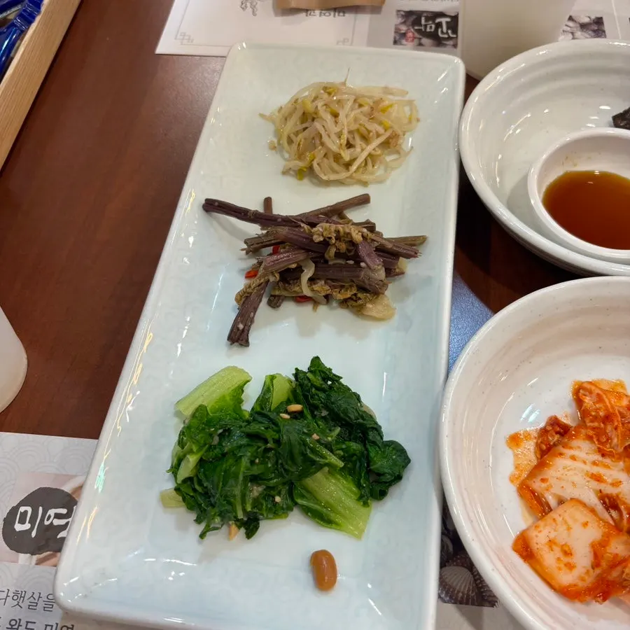 Plate of pickled vegetables and salad side dishes