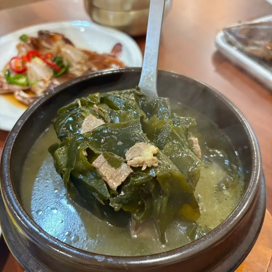 Close-up of seaweed soup showing the seaweed's texture