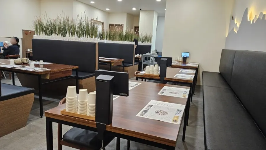 Seating area at Mikodam suited to family dining