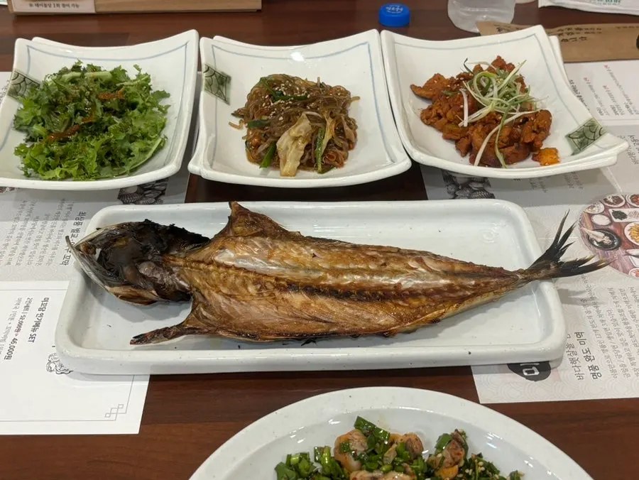 Large grilled mackerel served as a basic side dish