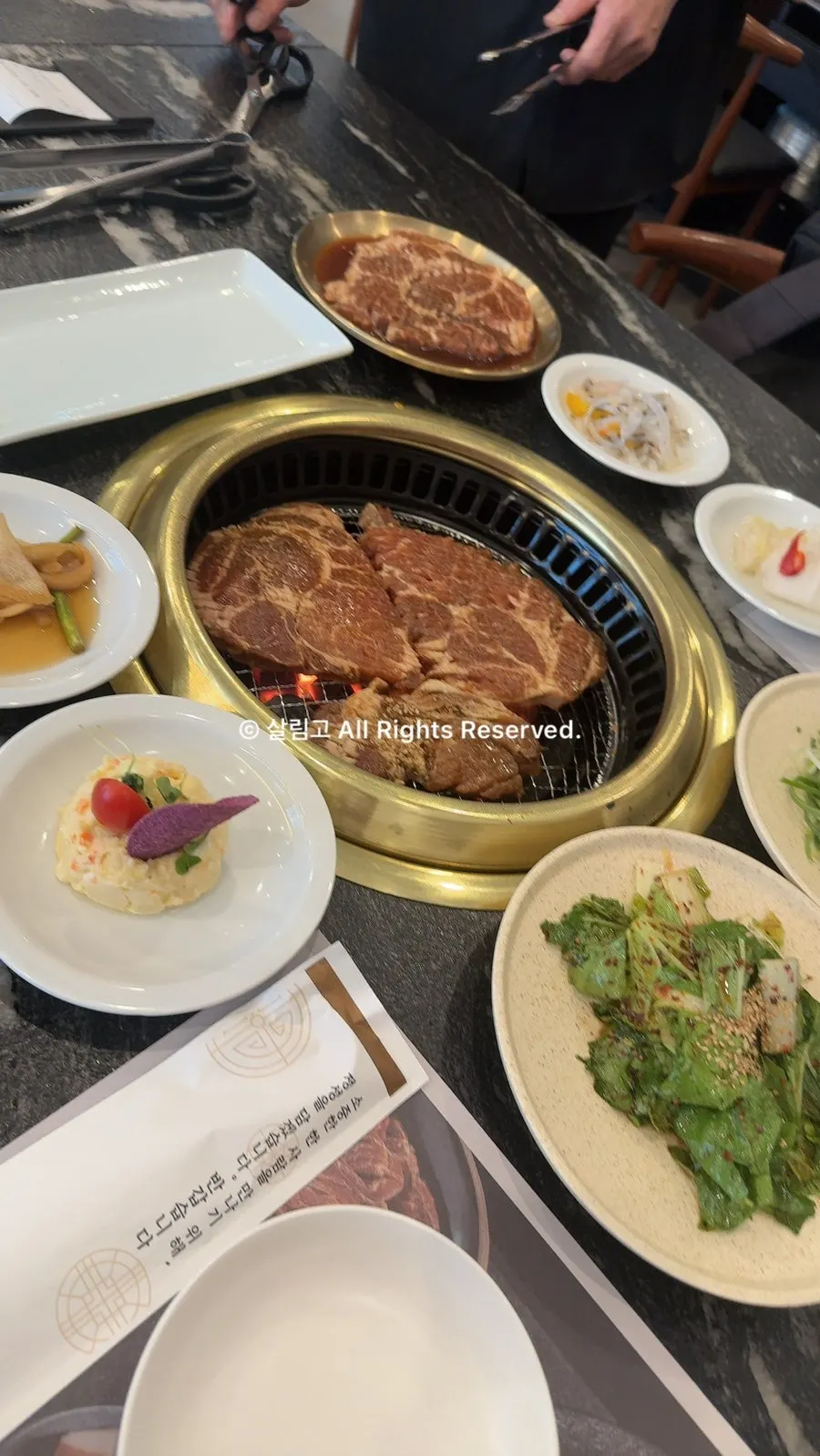 Marinated pork and neatly arranged basic side dishes