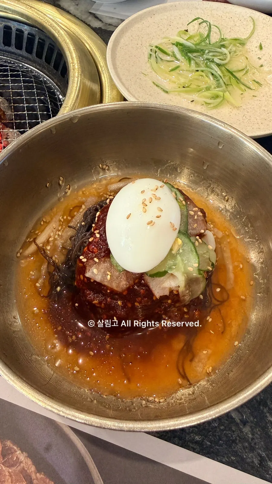 Bibim-naengmyeon ordered alongside the meat